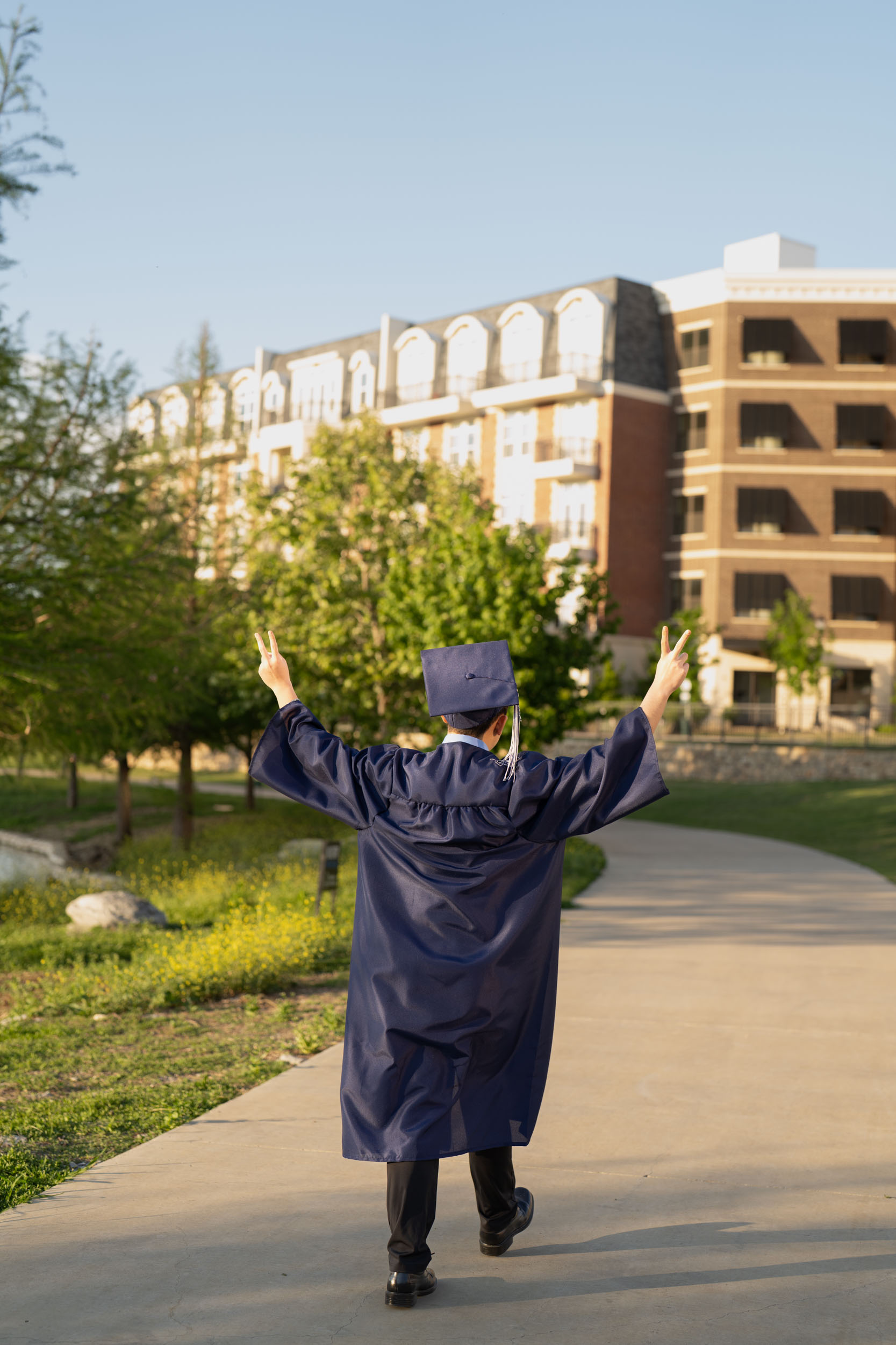 Dallas senior photo with cap and gown